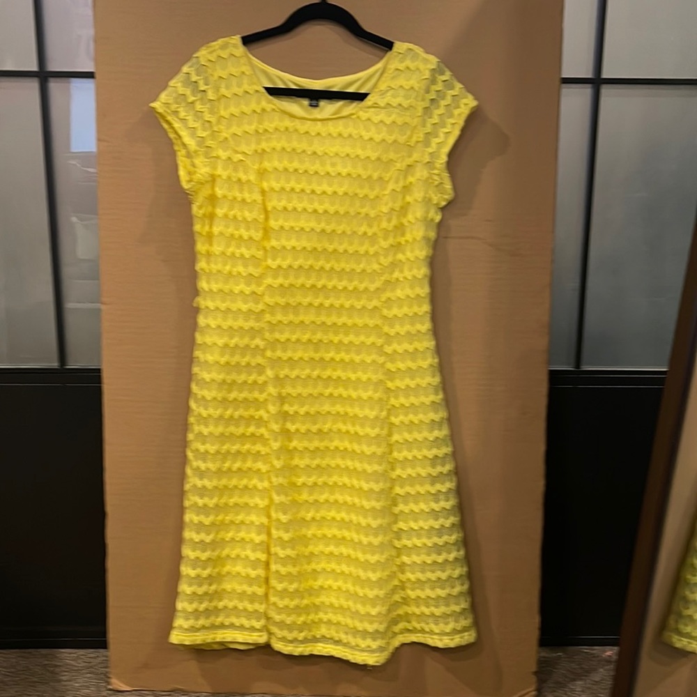 Short yellow short sleeved dress. New with tags